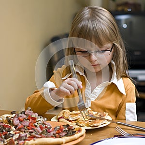 Girl eating pizza