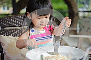 Girl Eating Spaghetti