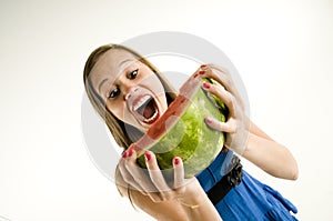 Girl eating a watermelon