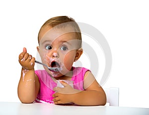 Girl eating yogurt