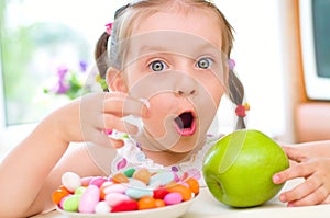 Girl eats candies