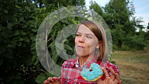 Girl eats donut