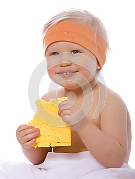 A girl eats a sandwich with cheese photo