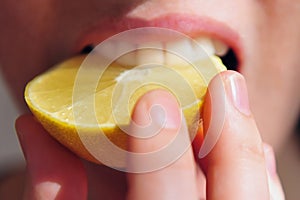 Girl Eats Sour Lemon