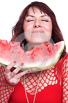 The girl eats a water-melon