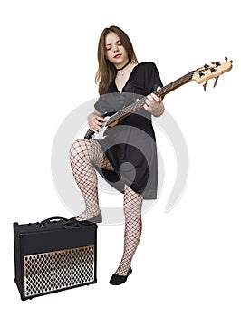 Girl with electric bass guitar