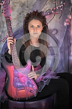 Girl with electric guitar