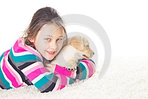 Girl embraces a puppy