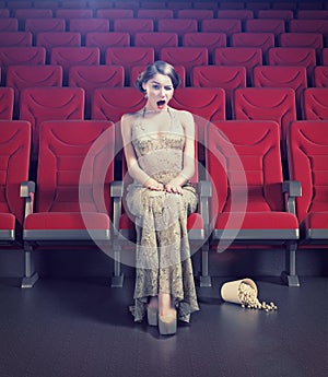 Girl in an empty cinema