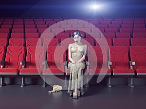 Girl in an empty cinema