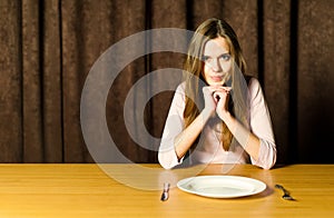 Girl with empty plate