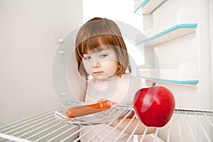 Girl and Empty Refrigerator