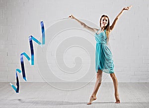 Girl is engaged in art gymnastics