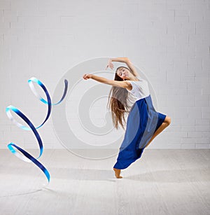 Girl is engaged in art gymnastics