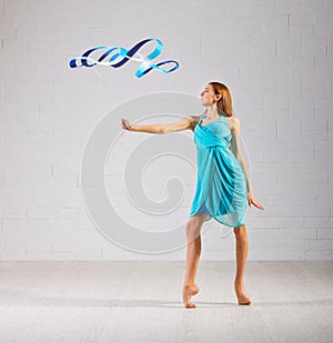 Girl is engaged in art gymnastics