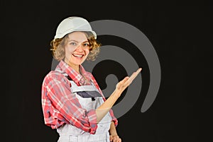 Girl engineer or architect. Home renovation. Lady at construction site. Warehouse woman worker. Quality inspector