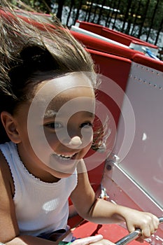 Girl enjoying amusement ride