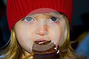 Girl enjoying a chocolate