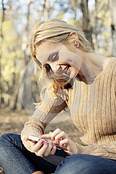 Girl enjoying internet wireless on smartphone in n