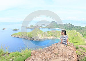 Girl enjoying view on Padar Island photo