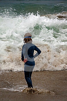 Girl Evaluates Rough Waves