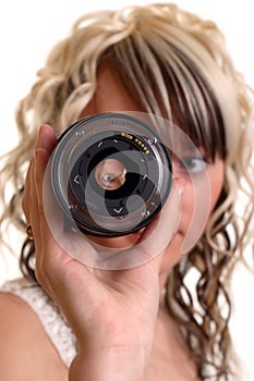 Girl examine lense