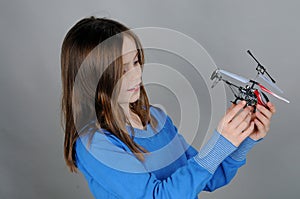 Young girl with helicopter