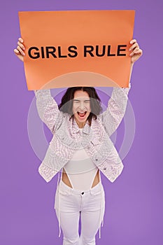 Girl expressing her rules with poster