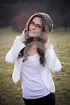 Girl with eyeglasses and wooll cap