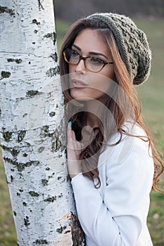 Girl with eyeglasses and wooll cap