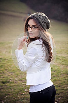 Girl with eyeglasses and wooll cap