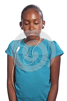 Girl eyes closed earphones in listening to music