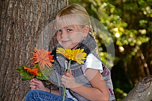 Girl with fall flowers