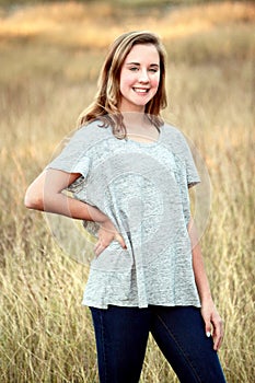 Girl in Fall Grass field