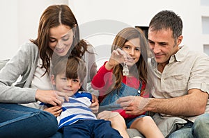 Girl With Family Showing House Key