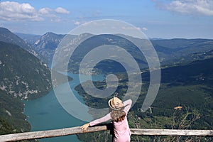 A girl on a fantastic viewpoint Banjska Stena Tara mountain photo