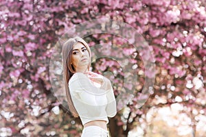 Girl in Fantasy Mystical and Magical Spring Garden. Fashion Model. Beauty Portrait