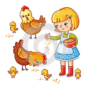 Girl feeding hens and chickens.