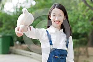 Girl feeding pigeons photo