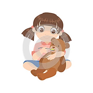 Girl Feeding A Teddy Bear