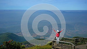 The girl is feeling refreshed on Doi Inthanon Mountain, Chiang Mai Province