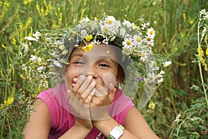 Girl in field flower garland