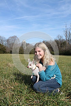 Girl In A Field With Her Dog