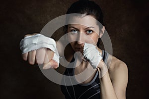 Girl fighter. The girl in a fighting stance.