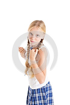 Girl in a fighting stance with clenched fists.