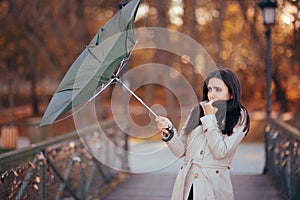 Girl Fighting The Wind Holding Umbrella Raining Weather