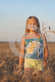 The girl in filed wheats.