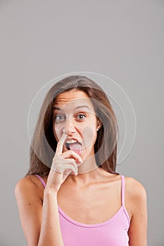 Girl with a finger in her nose