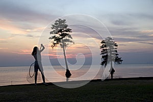 Girl with fishnet on sunset