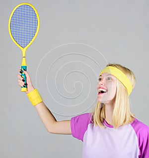 Girl fit slim blonde play tennis. Sport for maintaining health. Active lifestyle. Woman hold tennis racket in hand